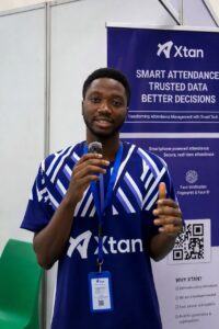 Folahan Olayiwola presenting Xtan smart attendance app at NITHUB Innovation Fair 2026